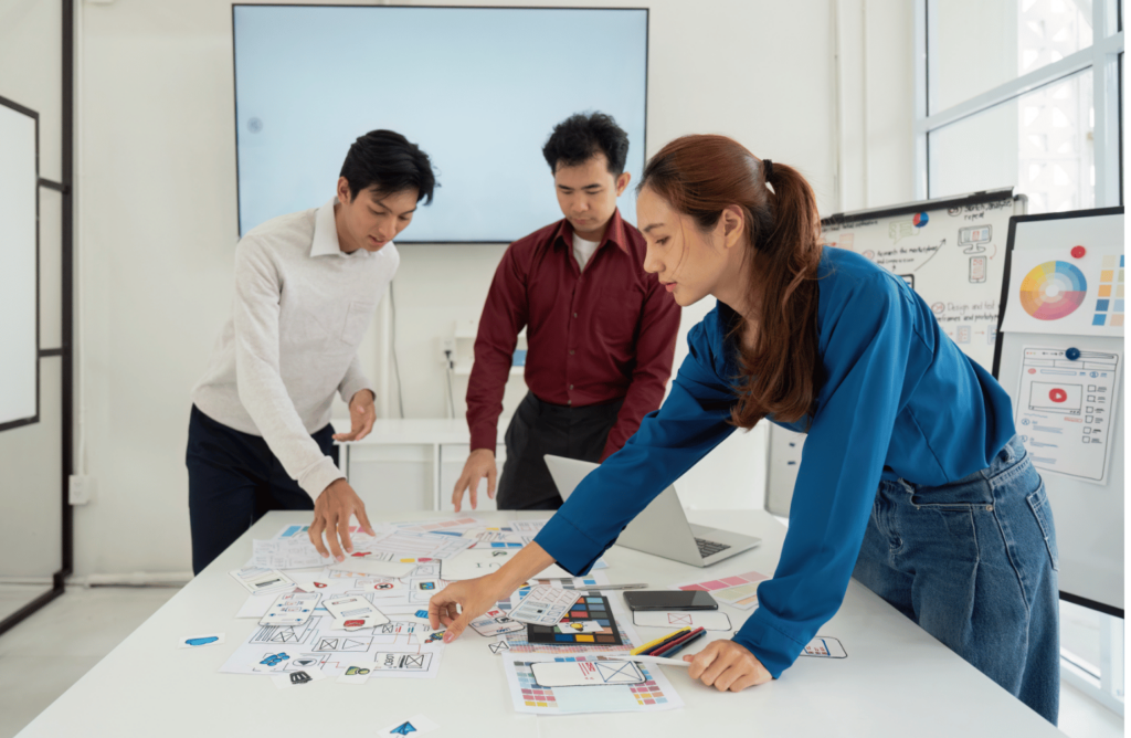 Team planning visuals of what is customer centricity in action.