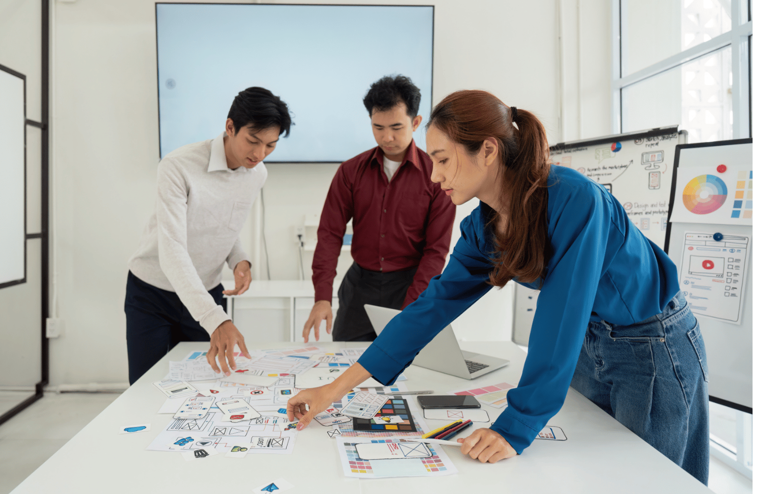 Team planning visuals of what is customer centricity in action.