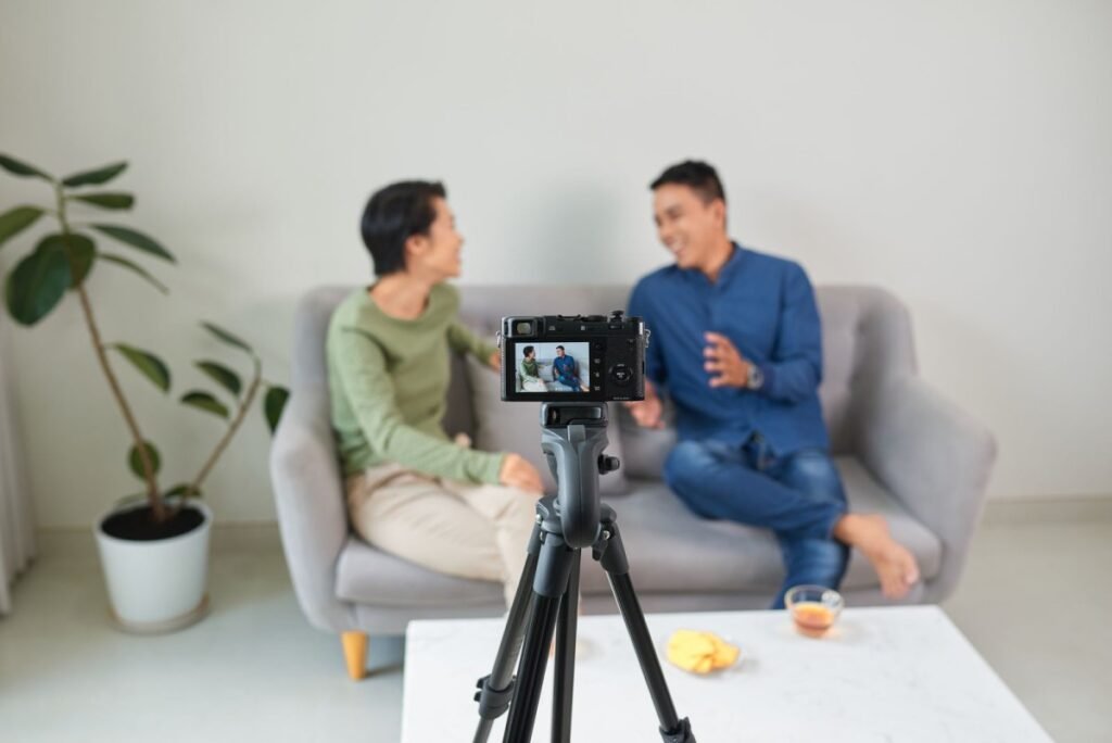  Young couple video bloggers streaming live video 